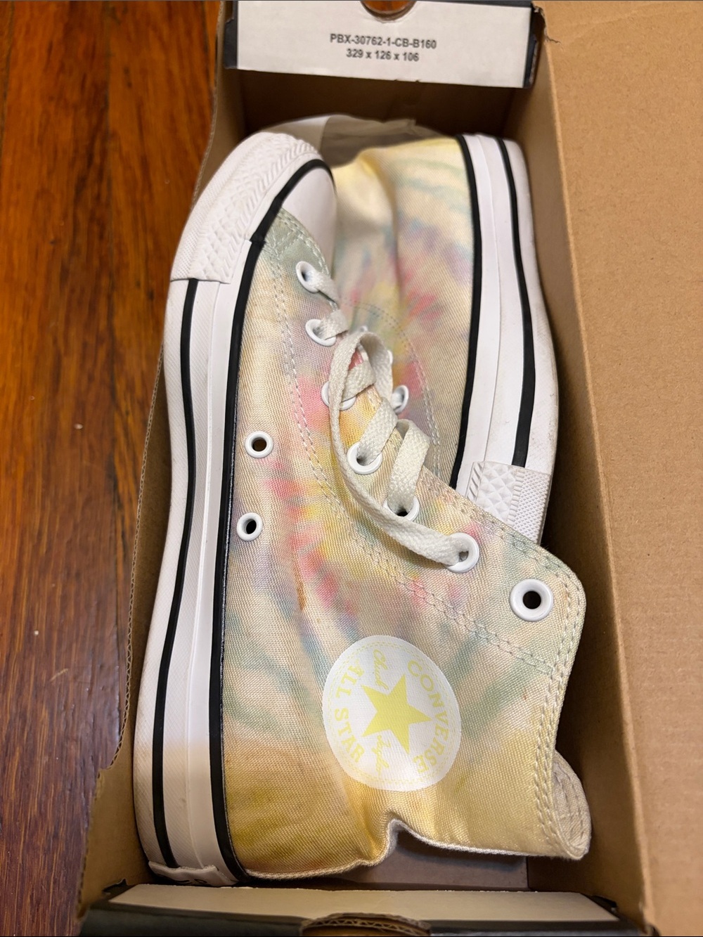 Converse Women’s High-Top Tie-Dye Canvas Sneakers in Pastel Yellow, Pink, Blue
